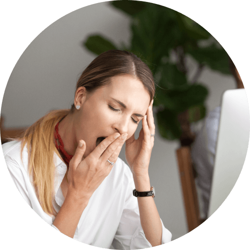 Exhausted man rubbing his eyes after another night of poor sleep